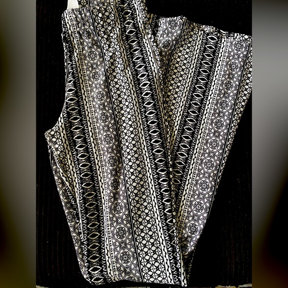Black and white flared leggings. - Picture 1 of 4